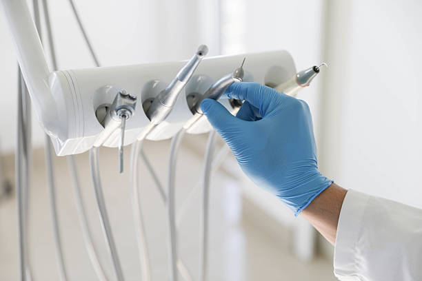 Professional Tooth Extraction technician working in Camden, OH
